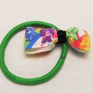 No 1: Bow on interchangeable rings for hairpin or elastic band Care Bears design